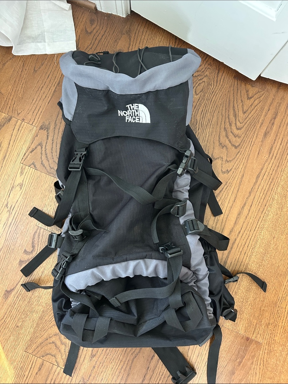 The North Face Black and Gray Hiking Backpack with Multiple Straps